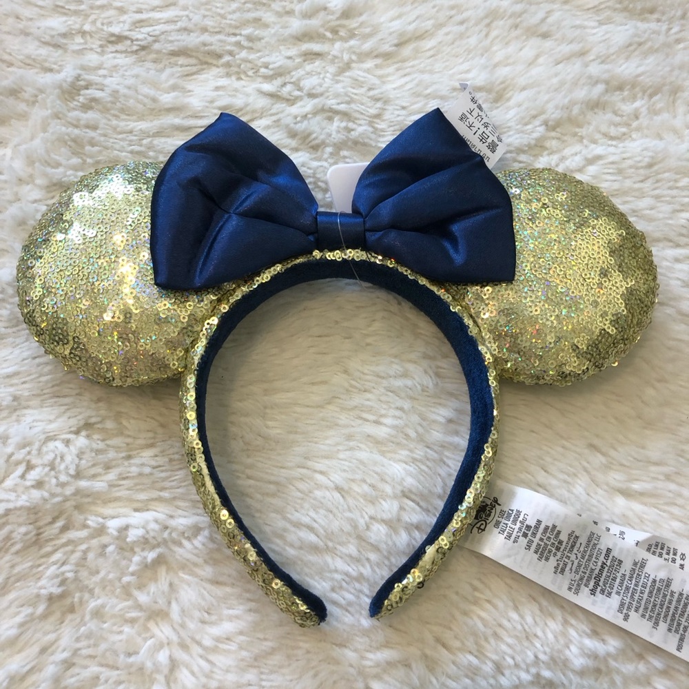 Disneys Minnie blue and gold iridescent ears